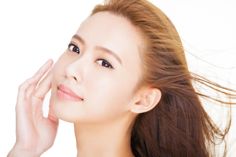 Close-up of person's face with various features.