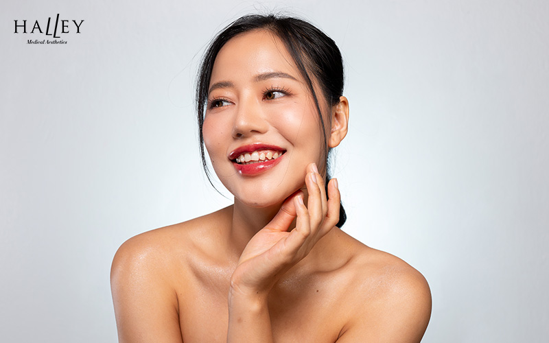 Woman with healthy glowing skin from a skin booster.