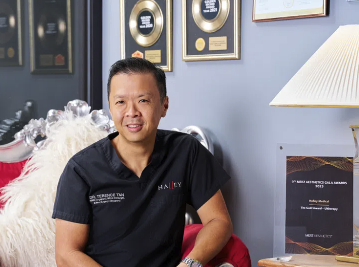 Dr Terrence Tan sitting in his office
