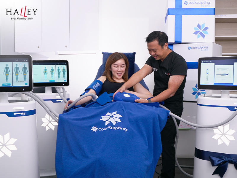 Dr. Terence Tan performing CoolSculpting Elite treatment on a patient