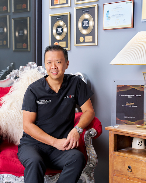 Dr Terrence Tan sitting in his office